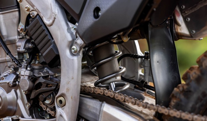 Redesigned SHOWA™ Rear Shock & Pro-Link